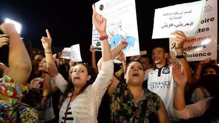 Manifestation à Casablanca le 28 juin 2015 suite à l'arrestation de deux femmes dont les tenues ont été jugées inapropriées. 

	
	  (Fadel Senna / AFP)