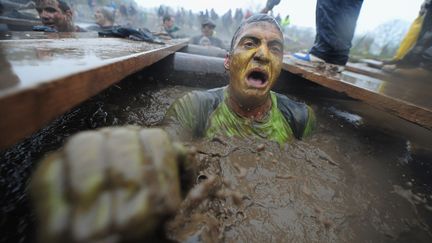 Plus dure que la plupart des entra&icirc;nements militaires, la Tough Guy Competition requiert des qualit&eacute;s physiques et une endurance hors normes. (JAMIE MCDONALD / GETTY IMAGES)