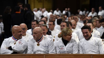 Les chefs Frédéric Anton, Eric Bouchenoire, Christelle Brua et Alain Pegouret assistent aux obsèques de Paul Bocuse, à Lyon, vendredi 26 janvier 2018.&nbsp; (AFP)