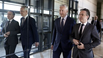 Bruno Le Maire et Christophe Béchu après la présentation du projet de loi "Industrie verte", à Bercy le 16 mai 2023. (GEOFFROY VAN DER HASSELT / AFP)