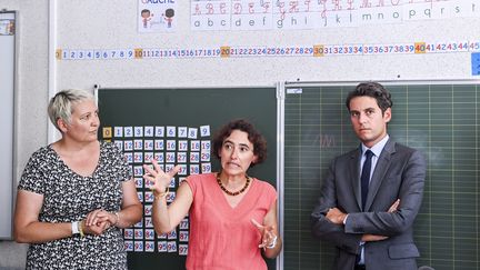 Gabriel Attal, ministre de l'Éducation nationale, en visite dans l'école Champollion,à Dijon, le 22 août 2023. (EMMA BUONCRISTIANI / MAXPPP)