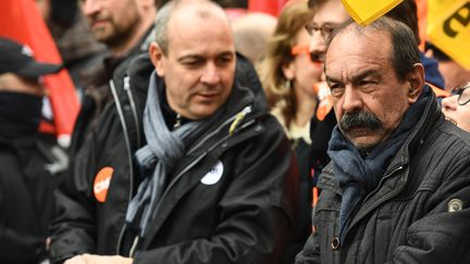 Laurent Berger (CFDT) et Philippe Martinez lors la manifestation à Paris contre la réforme des retraites du 11 février 2023. (CHRISTOPHE ARCHAMBAULT / AFP)