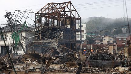 Un marché en ruine, le 3 janvier 2024 à Wajima (Japon), après les séismes qui ont secoué l'archipel deux jours plus tôt. (MASANORI INAGAKI / YOMIURI / AFP)