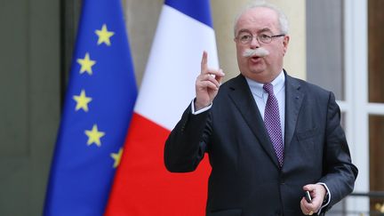 L'ancien patron de Total Christophe de Margerie quitte le Palais de l'Elys&eacute;e &agrave; Paris le 21 janvier 2014. (KENZO TRIBOUILLARD / AFP)