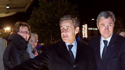 Nicolas Sarkozy &agrave; Tours, pour le concert de son &eacute;pouse, Carla Bruni, le 17 d&eacute;cembre 2013. (GUILLAUME SOUVANT / AFP)