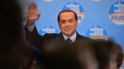 Silvio Berlusconi lors d'un meeting du PDL, le 3 f&eacute;vrier 2013, &agrave; Milan (Italie). (GIUSEPPE CACACE / AFP)