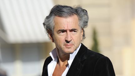 Le philosophe Bernard-Henri L&eacute;vy, &agrave; l'Elys&eacute;e, le 10 mars 2011, avant une rencontre avec Nicolas Sarkozy. (ERIC FEFERBERG / AFP)