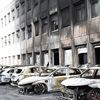 Les voitures de la police municipale de Neuilly-sur-Marne (Seine-Saint-Denis), incendiées, le 29 juin 2023. (BERTRAND GUAY / AFP)