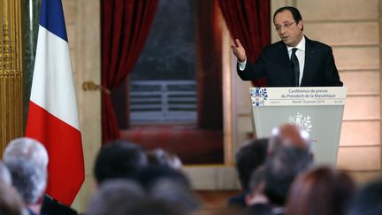 Le pr&eacute;sident Fran&ccedil;ois Hollande, mardi 14 janvier 2014 &agrave; l'Elys&eacute;e, lors d'une conf&eacute;rence de presse devant 580 journalistes fran&ccedil;ais et &eacute;trangers. (MAXPPP)