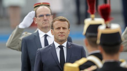 Le président Emmanuel Macron et le Premier ministre Jean Castex sur la place de la Concorde à Paris, le 14 juillet 2020. (Illustration) (CHRISTOPHE ENA / AP / AFP)