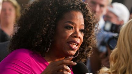 L'animatrice et productrice de t&eacute;l&eacute;vision am&eacute;ricaine&nbsp;Oprah Winfrey, le 12 ao&ucirc;t 2013&nbsp;&agrave; Los Angeles (Etats-Unis), lors de la premi&egrave;re du film "Le Majordome", dans lequel elle joue. (MIKE WINDLE / GETTY IMAGES NORTH AMERICA / AFP)