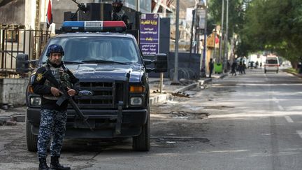 Un policier à Bagdad, en Irak, le 7 décembre 2018.&nbsp; (AHMAD AL-RUBAYE / AFP)