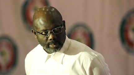 Le président George Weah à Abuja, le 21 décembre 2019.&nbsp; (KOLA SULAIMON / AFP)