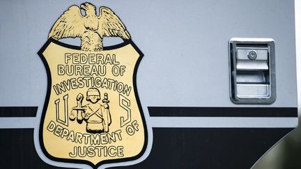 L'insigne du FBI
 (BRENDAN SMIALOWSKI / AFP)