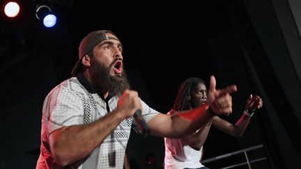 Le rappeur Médine lors d'un concert aux Trois Ponts, à Roubaix (Nord), le 13 août 2015. (HUBERT VAN MAELE / MAXPPP)