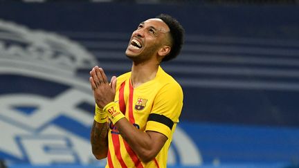 Pierre-Emerick Aubameyang célèbre un but face au Real Madrid, dimanche 20 mars 2022. (PIERRE-PHILIPPE MARCOU / AFP)