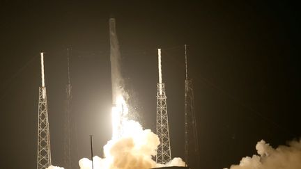 Le lanceur Falcon 9 de SpaceX d&eacute;colle, le 21 septembre &agrave; Cape Canaveral (Floride). (JOE RAEDLE / GETTY IMAGES NORTH AMERICA / AFP)