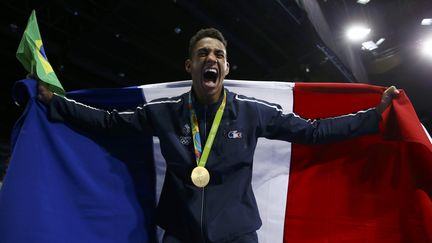 Tony Yoka lors de sa victoire en finale des supers-lourds, aux Jeux de Rio, dimanche&nbsp;21 août 2016. (PETER CZIBORRA / REUTERS)