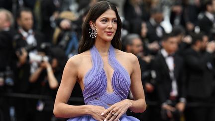 L'ancienne Miss France Iris Mittenaere lors de la 76e édition du Festival de Cannes, le 18 mai 2023. (PATRICIA DE MELO MOREIRA / AFP)