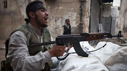 Combattants contre les forces gouvernementales. (AFP PHOTO / FABIO BUCCIARELLI)