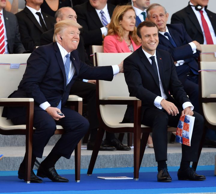 Donald Trump et Emmanuel Macron lors du défilé du 14-Juillet, à Paris, le 14 juillet 2017. (MUSTAFA YALCIN / ANADOLU AGENCY / AFP)