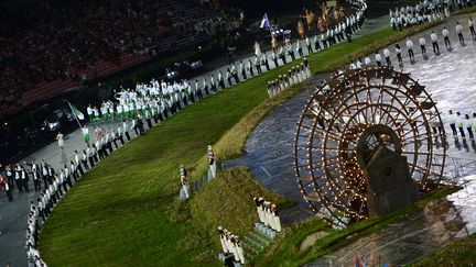 Hop hop hop, on s'active ! Les athl&egrave;tes d&eacute;filent sur une musique &agrave;&nbsp;120 battements par minute, pour les encourager &agrave; marcher plus vite. (FRANCK FIFE / AFP)