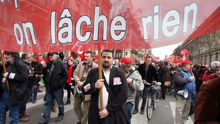 Les manifestants contre l'accord sur l'emploi, &agrave; Paris, le 5 mars 2013. (THOMAS SAMSON / AFP)