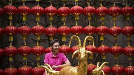 devant un temple, dans le quartier chinois de Bangkok.
 
 
 (REUTERS/Damir Sagolj )