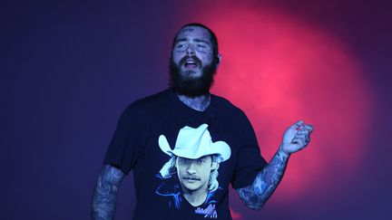 Post Malone lors d'un concert au Qatar le 16 décembre 2022. (GIUSEPPE CACACE / AFP)