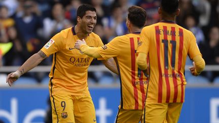 La MSN en action: Luis Suarez félicité par Messi et Neymar (MIGUEL RIOPA / AFP)