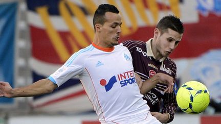 Foued Kadir (à gauche) face à Loris Nery (ANNE-CHRISTINE POUJOULAT / AFP)