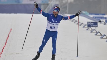 Benjamin Daviet, champion paralympique du 12,5 kilomètres en biathlon lors des Jeux de Pékin, le 11 mars 2022. (MOHD RASFAN / AFP)