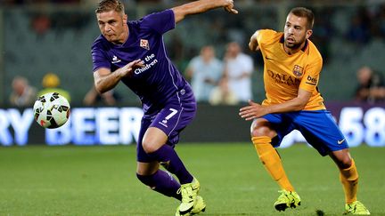 Joaquin (Fiorentina) et Jordia Alba (Barcelone) (TIZIANA FABI / AFP)