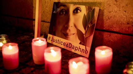 Une veillée organisée à la mémoire de&nbsp;Daphne Caruana Galizia, le 16 octobre 2019 à Berlin. (CHRISTOPH SOEDER / DPA / AFP)