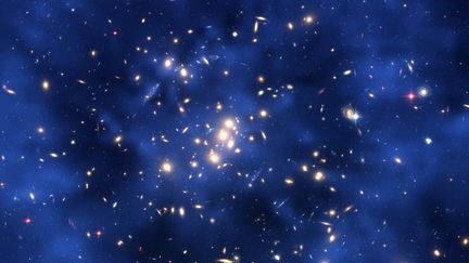 En bleu fonc&eacute;, un anneau de mati&egrave;re noire a &eacute;t&eacute; observ&eacute; par le satellite Hubble au centre d'une galaxie situ&eacute;e &agrave; 5 milliards d'ann&eacute;es-lumi&egrave;re de la Terre, le 15 mai 2007. (NASA / AFP)