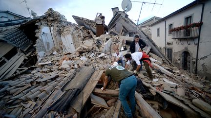 Selon le maire d'Amatrice, la moitié du village a été détruit (FILIPPO MONTEFORTE / AFP)