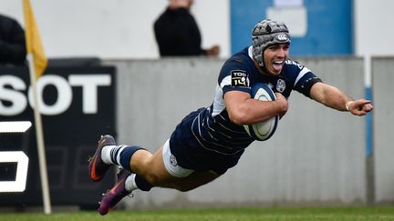 L'arrière d'Agen Clément Laporte. (THIERRY BRETON / AFP)