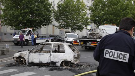  (En août 2012, de nombreux bâtiments d'Amiens-Nord avaient été brûlés et 17 policiers blessés © Reuters - Pascal Rossignol)