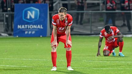 Les joueurs de Nancy après le match nul contre Bourg-en-Bresse, synonyme de relégation, le 26 mai 2023. (MAXPPP)