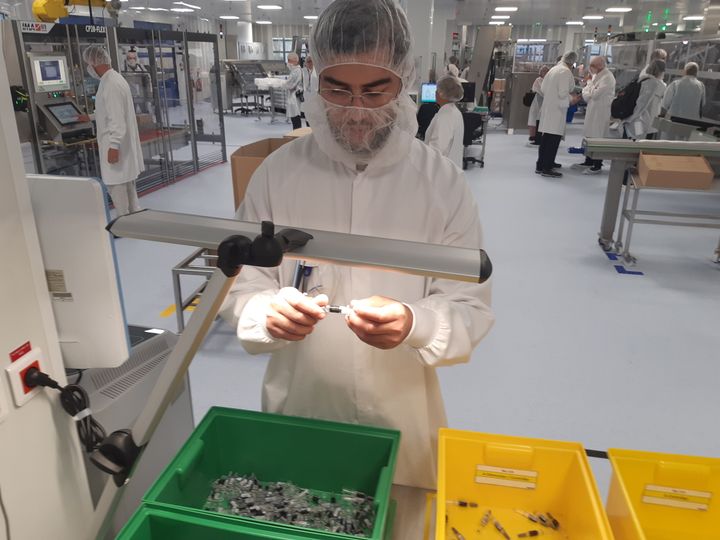 In the Sanofi factory, after making a small hole in each egg, the flu virus is grown there.  (SOLENNE LE HEN / RADIO FRANCE)