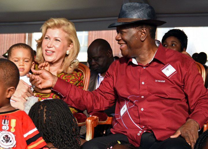 Le couple présidentiel ivoirien le 20 décembre 2014 lors d'un évènement organisé par la Fondation Children of Africa à l'occasion des fêtes de Noël. 
 (SIA KAMBOU / AFP)