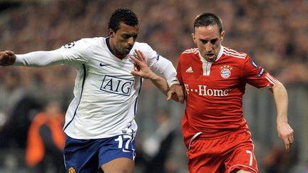 Nani face à Ribéry, lors du quart de finale aller du 30 mars 2010.  (ANDREW YATES / AFP)