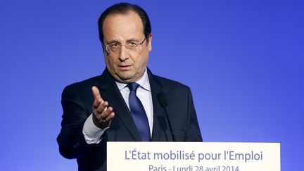 Fran&ccedil;ois Hollande &agrave;&nbsp;La Maison de la Chimie, &agrave; Paris, le 28 avril 2014 (YOAN VALAT / AFP)