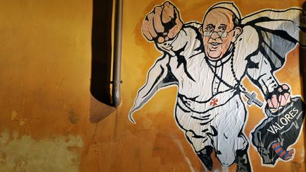 Le pape François en Superman sur un mur de Rome (janvier 2013)
 (Tiziana Fabi / AFP)