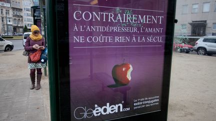 Une affiche publicitaire de Gleeden, &agrave; Bruxelles (Belgique), le 24 f&eacute;vrier 2012. (BRUNO FAHY / BELGA / AFP)