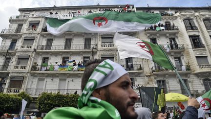 Manifestation contre le candidature à un 5e mandat et le maintien au pouvoir d'Abdelaziz Bouteflika, le 22 mars 2019 (RYAD KRAMDI / AFP)