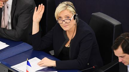 La présidente du Rassemblement national Marine Le Pen, lors d'un vote au Parlement européen, à Strasbourg, le 22 novembre 2016.&nbsp; (FREDERICK FLORIN / AFP)