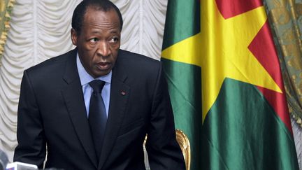 L'ex-pr&eacute;sident Blaise Compaor&eacute;, le 26 juillet 2014, &agrave; Ouagadougou (Burkina Faso).&nbsp; (SIA KAMBOU / AFP)