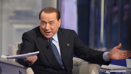 Silvio Berlusconi assiste &agrave; une &eacute;mission de la RAI, le 22 mai 2014, &agrave; Rome.&nbsp; (TIZIANA FABI / AFP)