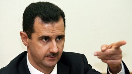 Le pr&eacute;sident syrien Bachar Al-Assad le 19 d&eacute;cembre 2006 lors d'une conf&eacute;rence de presse &agrave; Moscou (Russie). (YURI KADOBNOV / AFP)